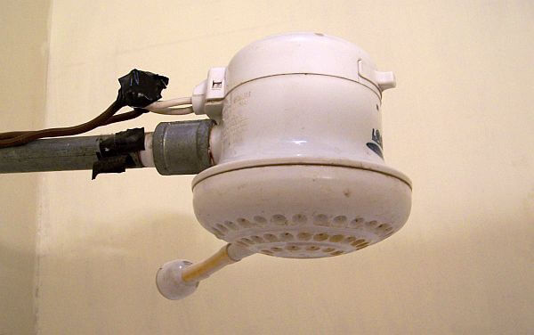 suicide shower for hot water in cheap hotel