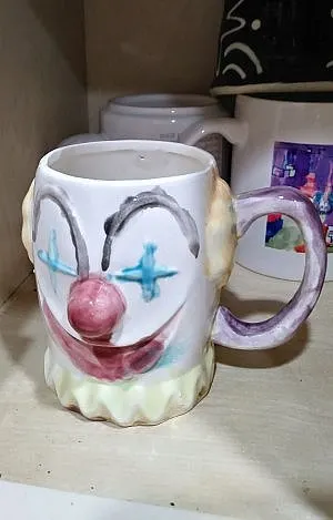 Old mug from childhood, another thing to get rid of when shedding possessions to move abroad