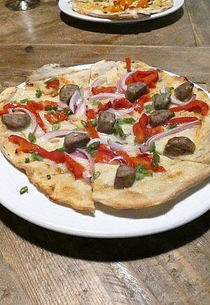 Farm to table flatbread from Coltivate Culinary Center on a tour with Ithaca is Foodies