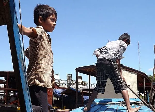 I travel to meet kids on the other side of the world