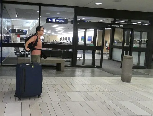 legacy airlines in the USA charge for checked bags